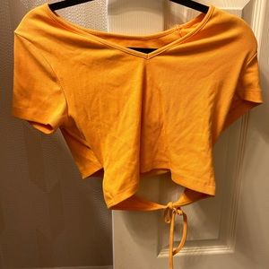 wild fable orange tshirt with slit in the back
